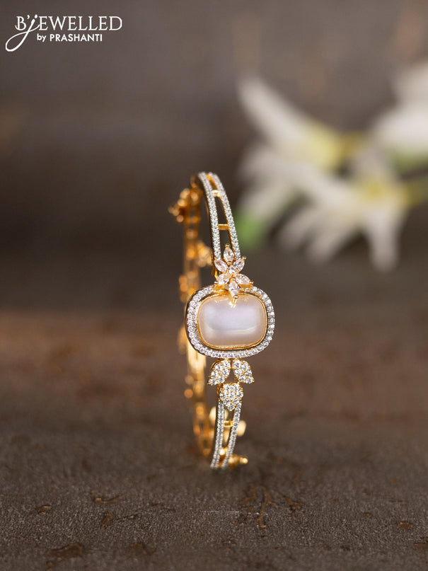 Bracelets with cz stones and pearls & hangings in gold finish