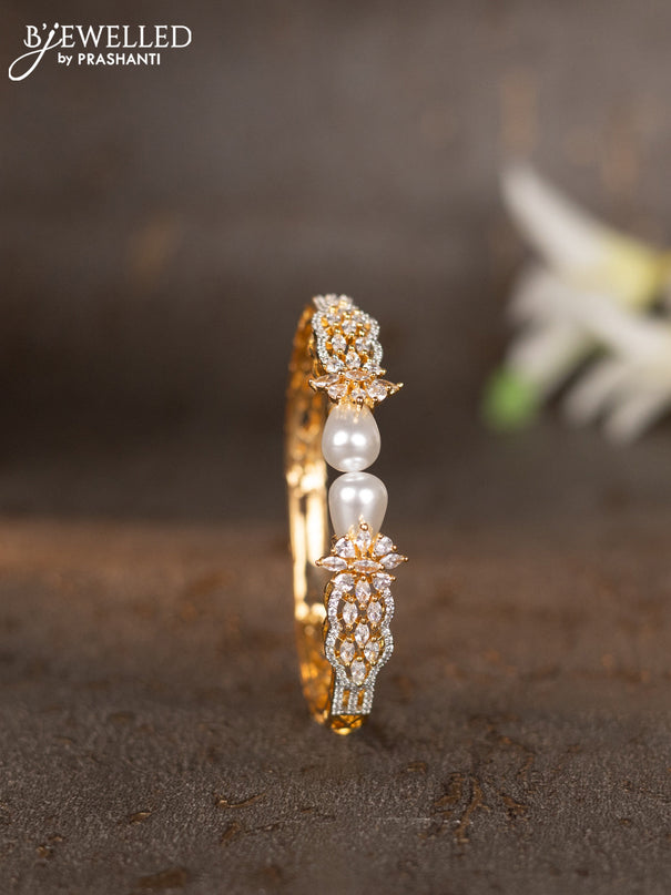 Bracelets with cz stones and pearls in gold finish