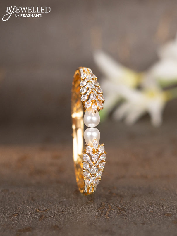 Bracelets with cz stones and pearls in gold finish