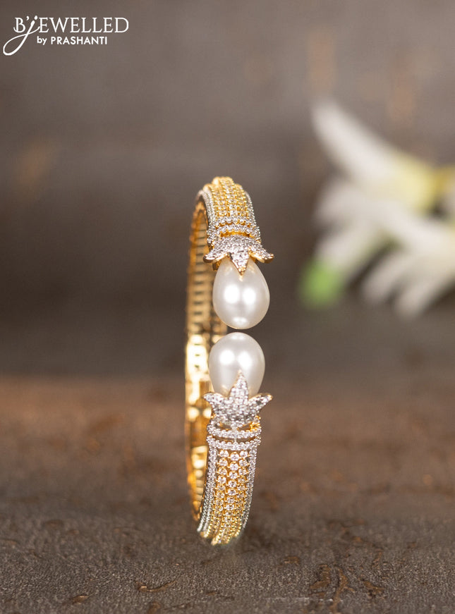 Bracelets with cz stones and pearls in gold finish