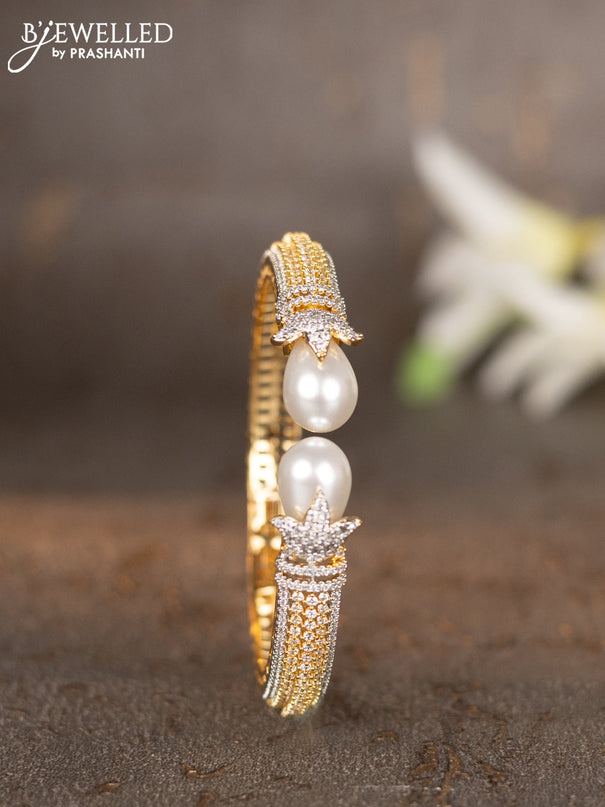 Bracelets with cz stones and pearls in gold finish