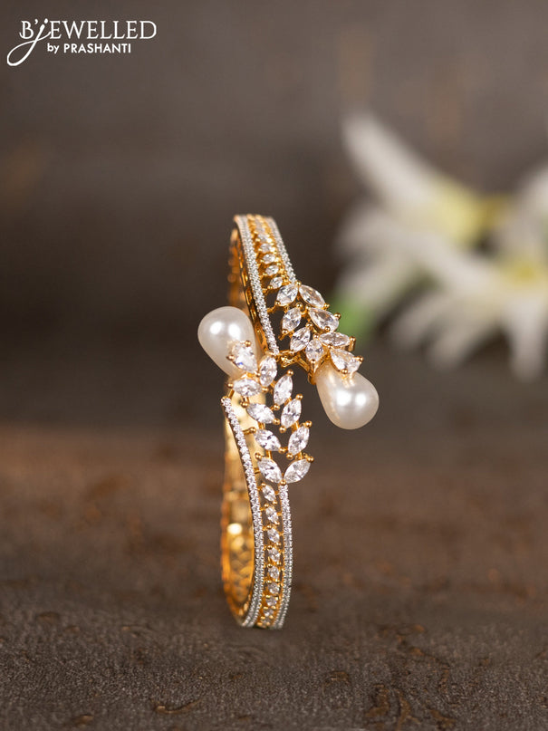 Bracelets with cz stones and pearls in gold finish