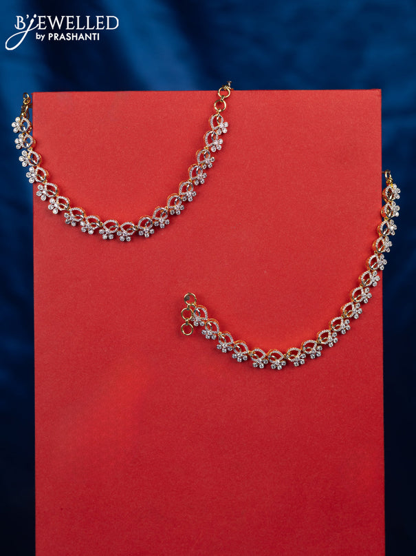 Zircon maatal with cz stones in gold finish