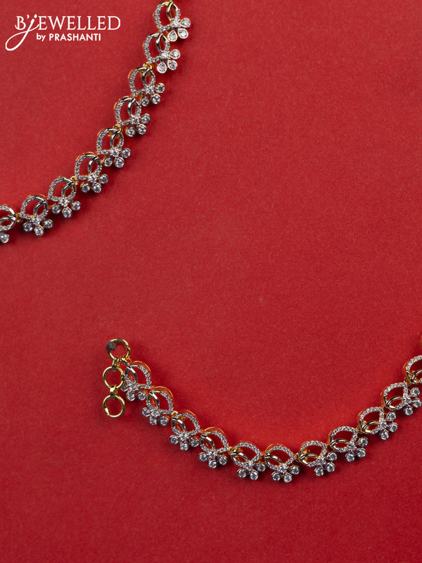 Zircon maatal with cz stones in gold finish