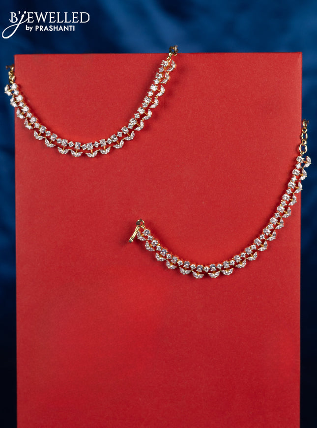 Zircon maatal with cz stones in gold finish