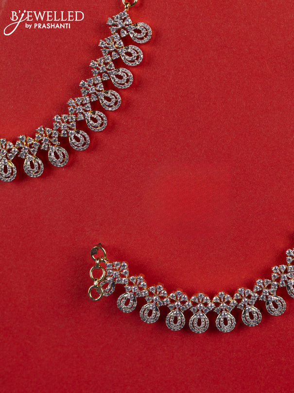 Zircon maatal with cz stones in gold finish