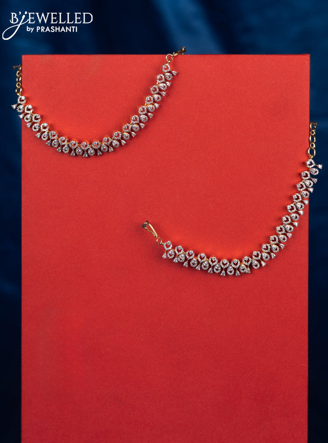 Zircon maatal with cz stones in gold finish