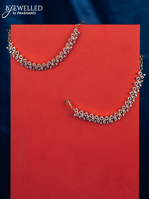 Zircon maatal with cz stones in gold finish