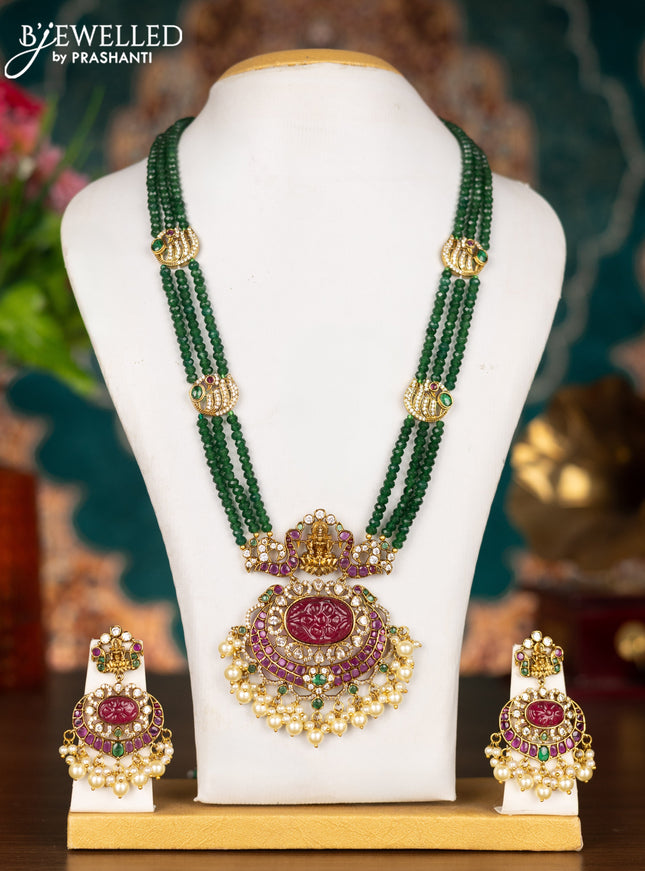 Beaded triple layer green necklace lakshmi pendant with kemp & cz stone and pearl hangings