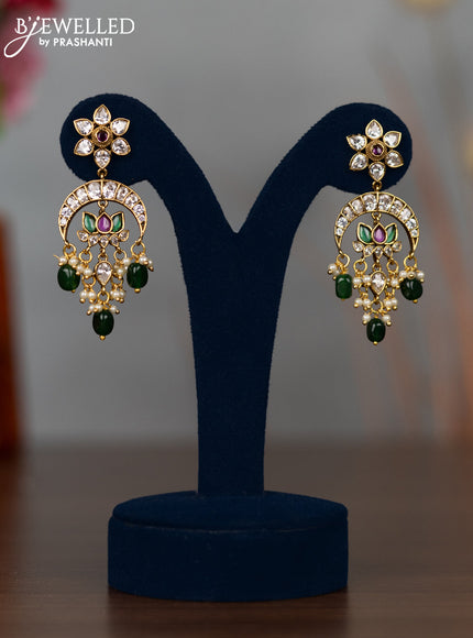 Antique earrings lotus design with kemp & cz stones and pearl & green beads hangings