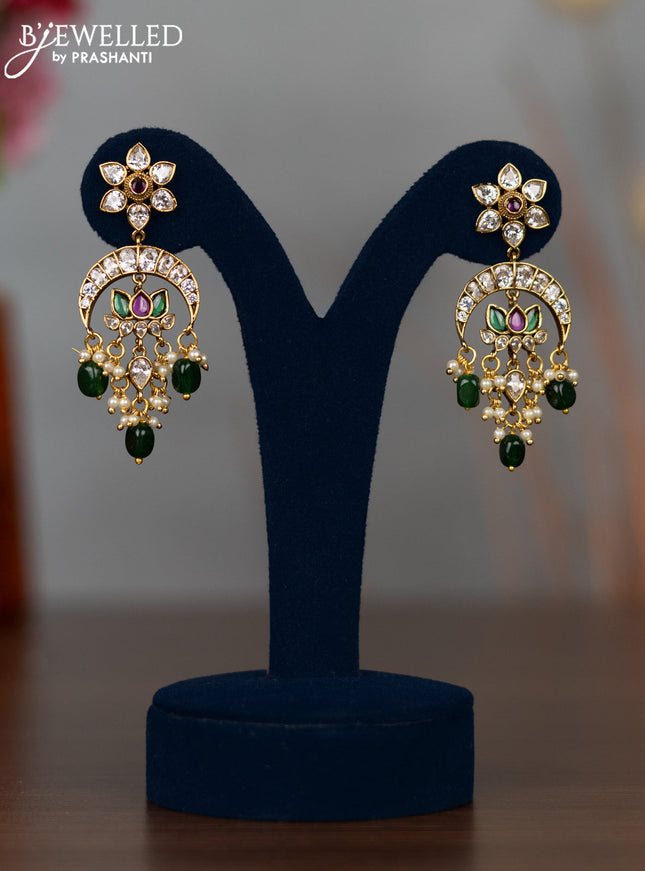 Antique earrings lotus design with kemp & cz stones and pearl & green beads hangings