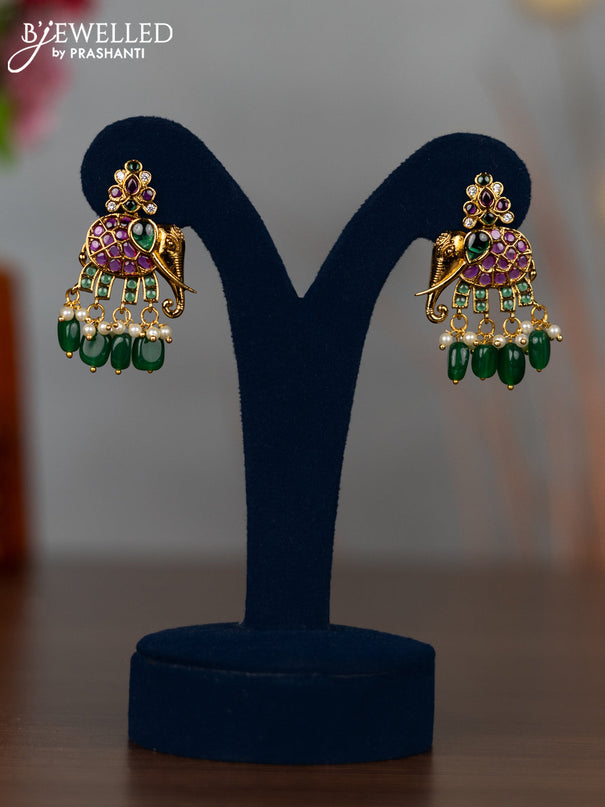 Antique earrings elephant design with kemp & cz stones and pearl & green beads hangings