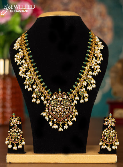 Antique guttapusalu necklace manga & peacock design with kemp & cz stones and pearl hangings