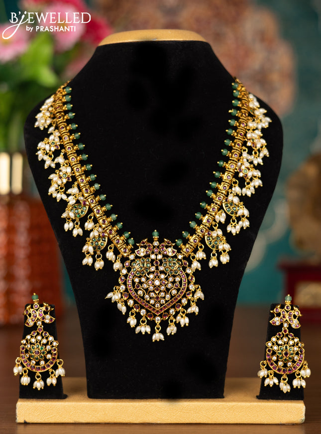 Antique guttapusalu necklace manga & peacock design with kemp & cz stones and pearl hangings