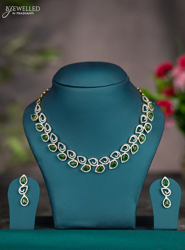 Zircon necklace with emerald and cz stones in gold finish