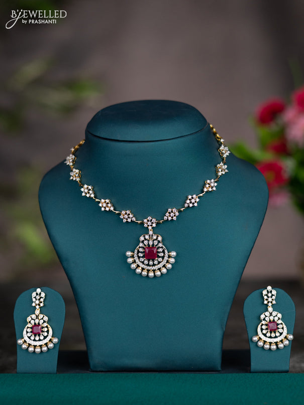 Zircon necklace with ruby & cz stones and pearl hangings in gold finish