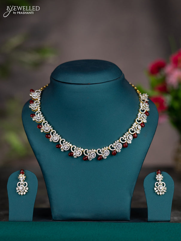 Zircon necklace with maroon beads and cz stones in gold finish