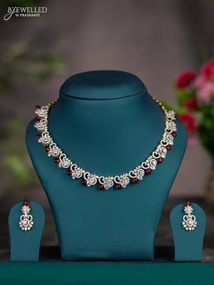 Zircon necklace with maroon beads and cz stones in gold finish