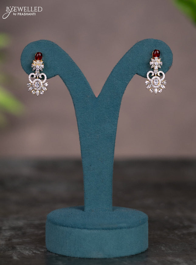 Zircon necklace with maroon beads and cz stones in gold finish