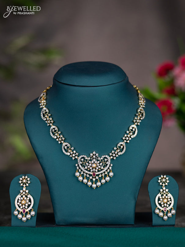 Zircon necklace with ruby & cz stones and pearl hangings in gold finish