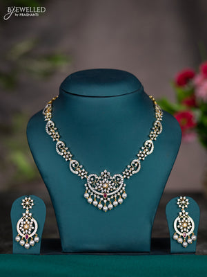 Zircon necklace with ruby & cz stones and pearl hangings in gold finish