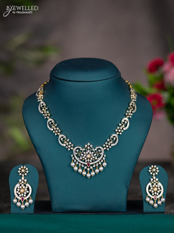 Zircon necklace with ruby & cz stones and pearl hangings in gold finish