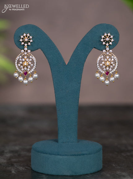 Zircon necklace with ruby & cz stones and pearl hangings in gold finish