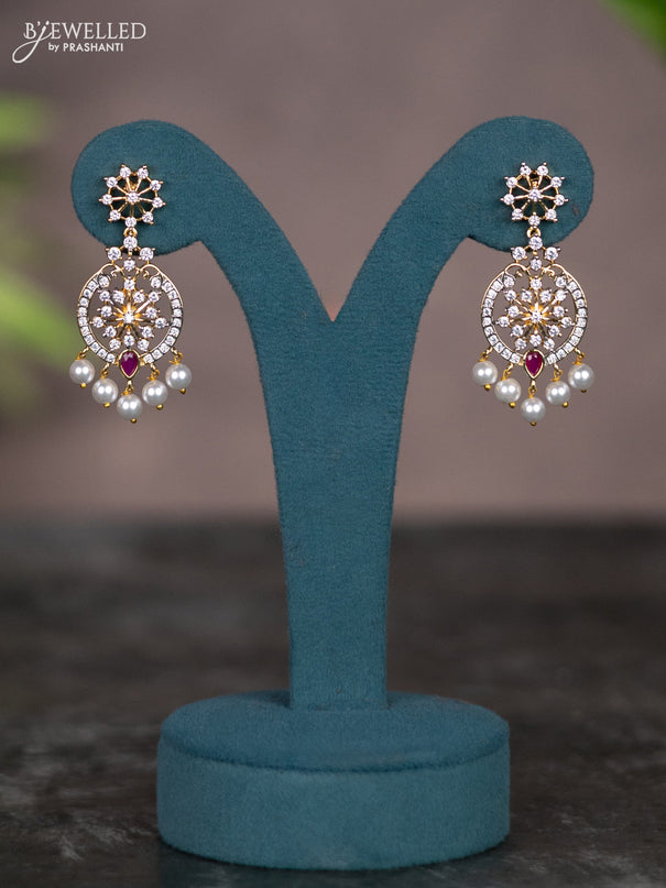 Zircon necklace with ruby & cz stones and pearl hangings in gold finish