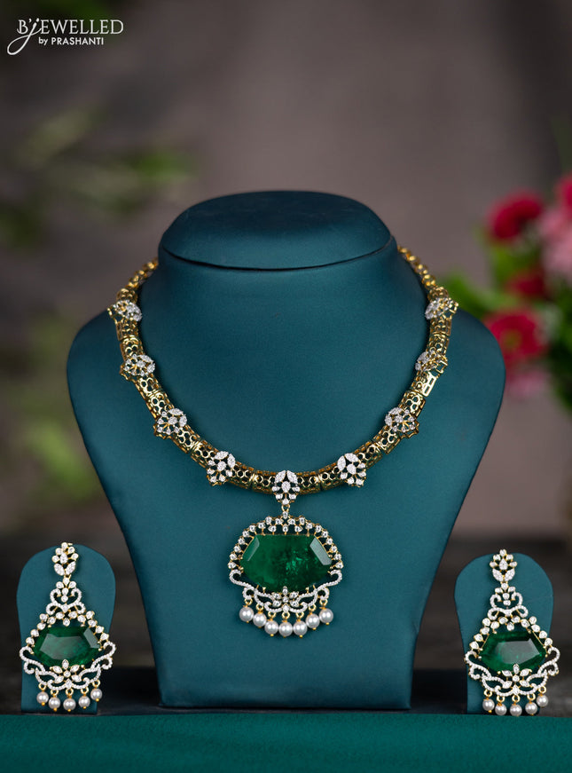 Zircon necklace with emerald & cz stones and pearl hangings in gold finish