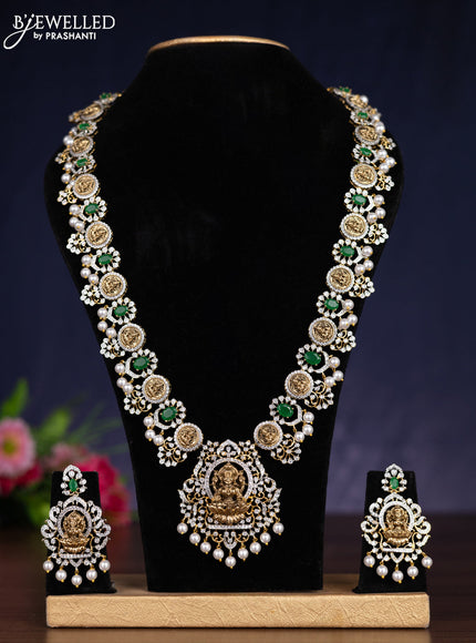 Zircon haram lakshmi design with emerald & cz stones and pearl hangings in gold finish
