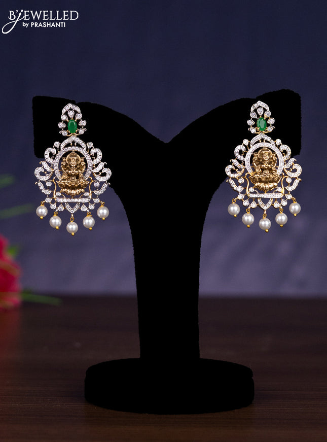 Zircon haram lakshmi design with emerald & cz stones and pearl hangings in gold finish