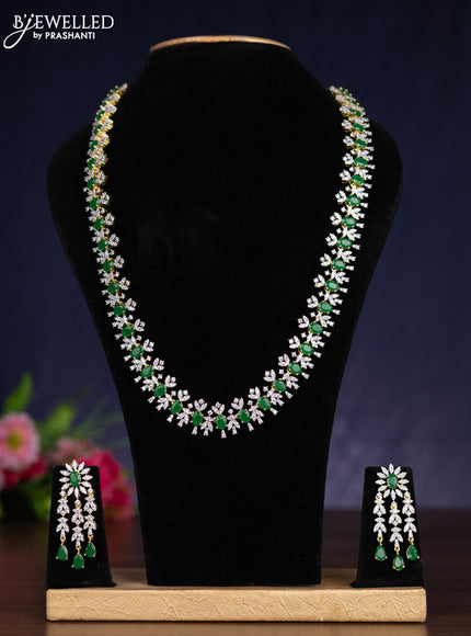 Zircon haram with emerald and cz stones in gold finish