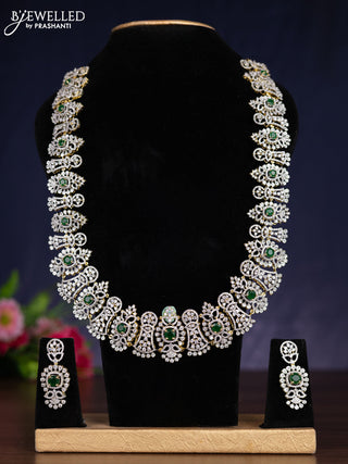 Zircon haram with emerald and cz stones in gold finish