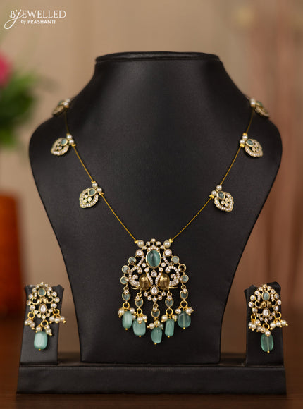 Invisible chain elephant design with mint green & kundan cz stones and beads hangings