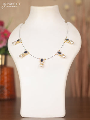 Invisible chain with sapphire & cz stones and pearls in gold finish