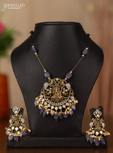 Invisible chain ganesha pendant with cz stones and pearl & purple beads hangings