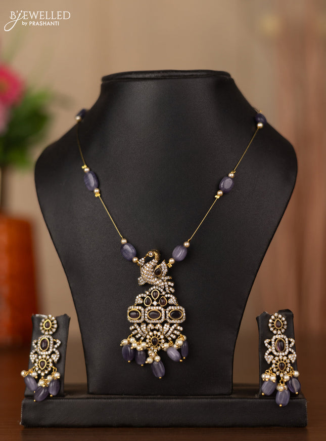 Invisible chain peacock design with purple & cz stones and beads hangings