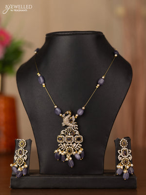 Invisible chain peacock design with purple & cz stones and beads hangings