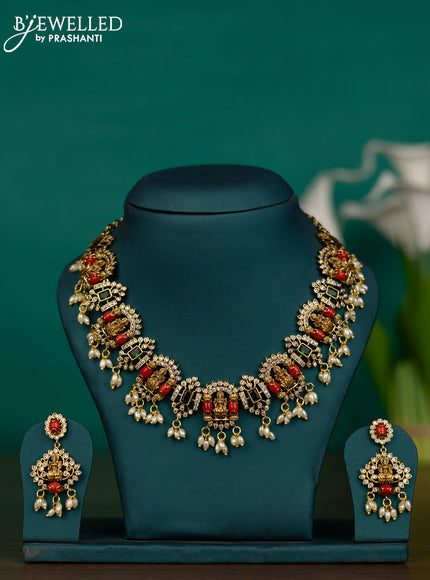 Antique guttapusalu pavalam necklace with green kemp & cz stones and pearl hangings