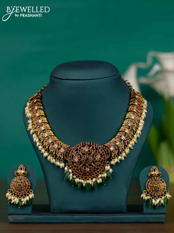 Antique guttapusalu necklace chandbali & floral design with kemp & kundan stones and pearl hangings & green beads hangings