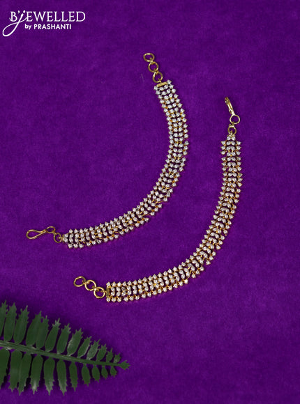 Zircon maatal with cz stones in gold finish