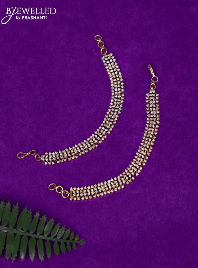 Zircon maatal with cz stones in gold finish