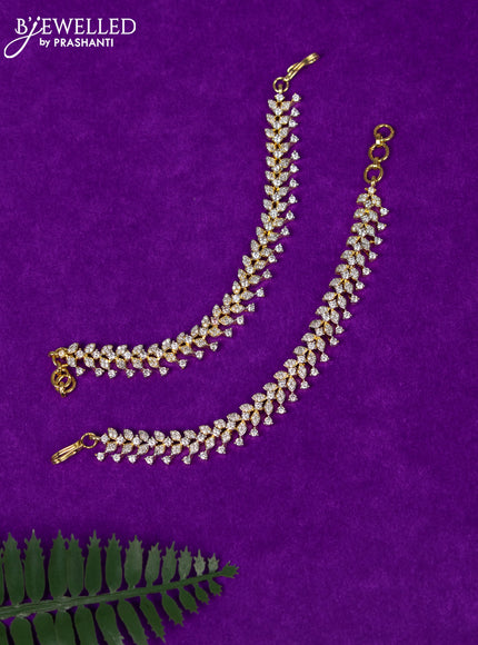 Zircon maatal with cz stones in gold finish
