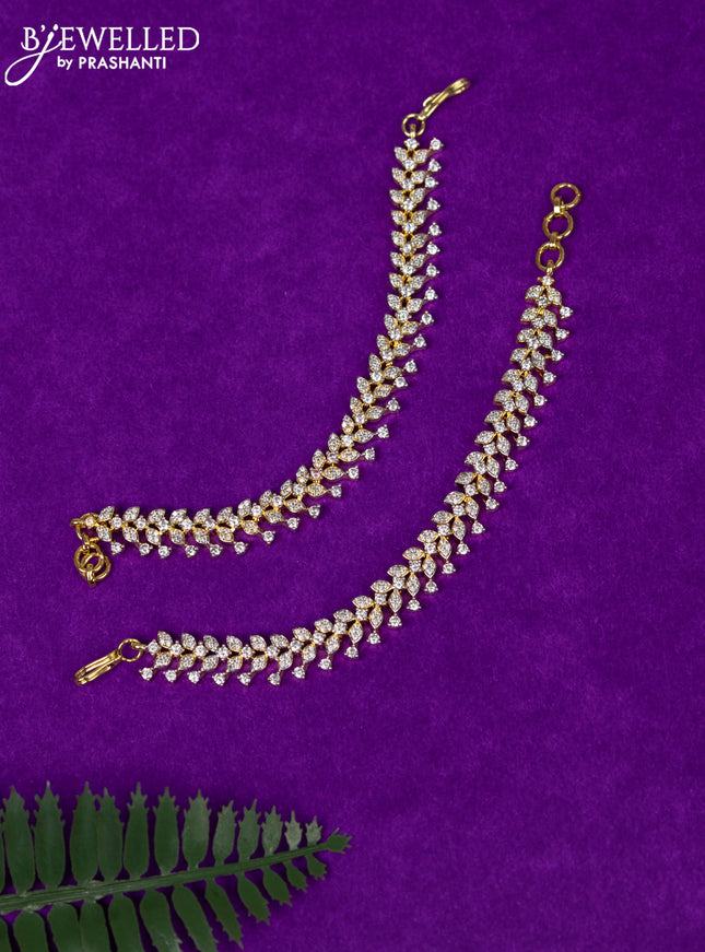 Zircon maatal with cz stones in gold finish