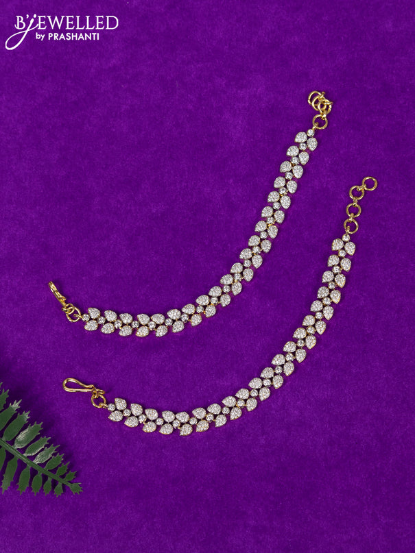 Zircon maatal with cz stones in gold finish