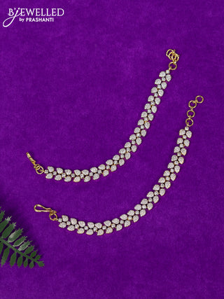 Zircon maatal with cz stones in gold finish