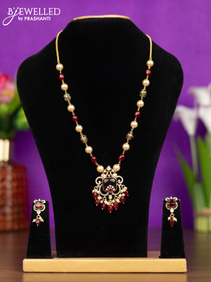 Beaded necklace peacock design with maroon & kundan cz stones and pearl & maroon beads hangings
