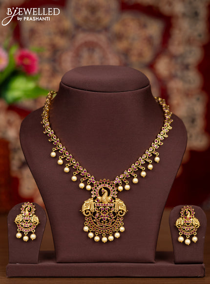 Antique necklace elephant design with ruby stones and pearl hangings