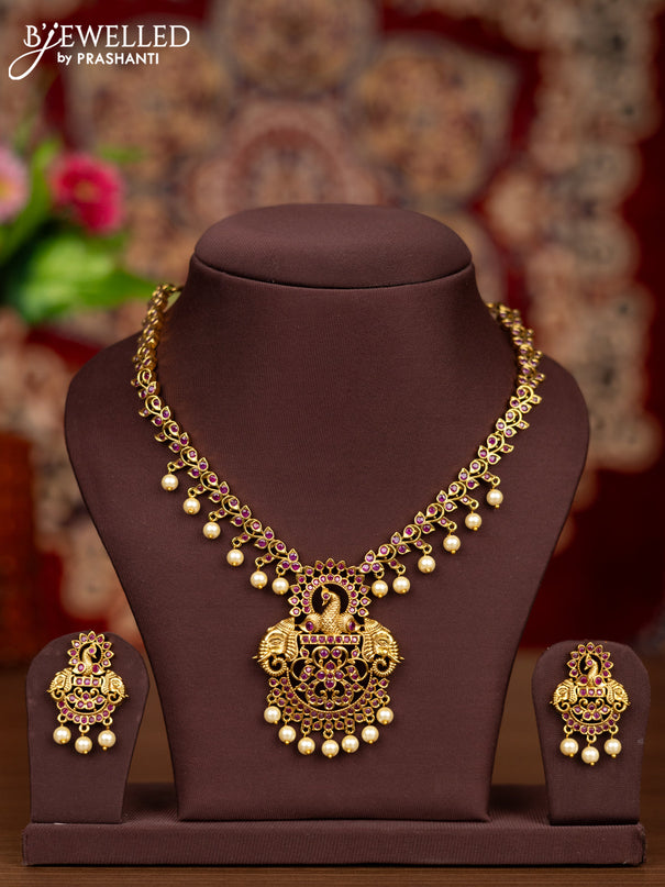 Antique necklace elephant design with ruby stones and pearl hangings