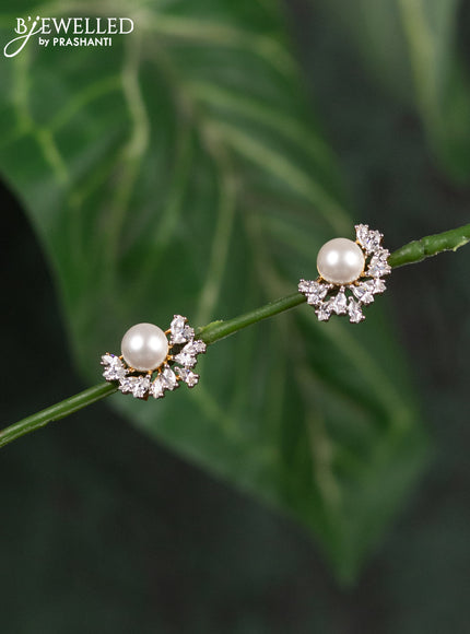 Zircon earrings with cz stones and pearl in gold finish